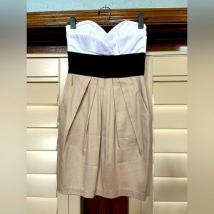 Elegant Black and Cream Dress with Pockets